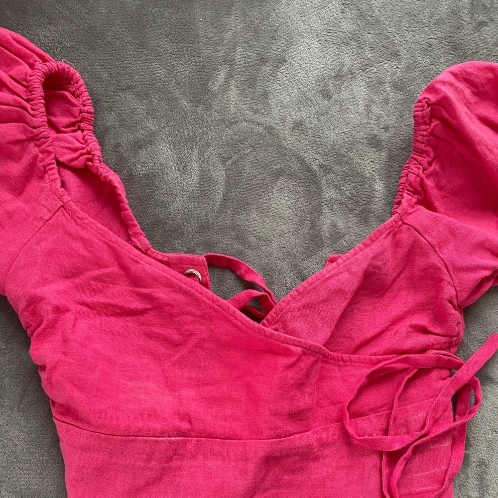 Pink linen top with a tied back
